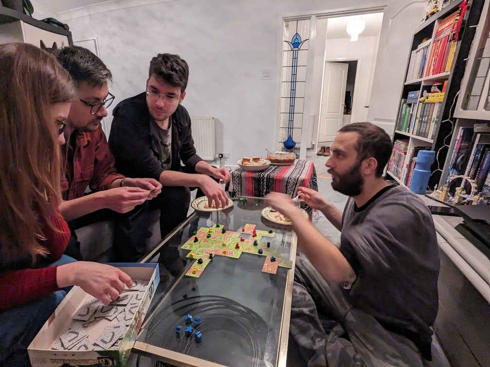 people playing board games