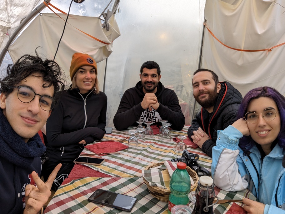 5 people having lunch after a hike